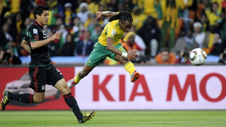Siphiwe Tshabalala runs with the ball to score the opening goal during 2010 World Cup on June 11, 2010
