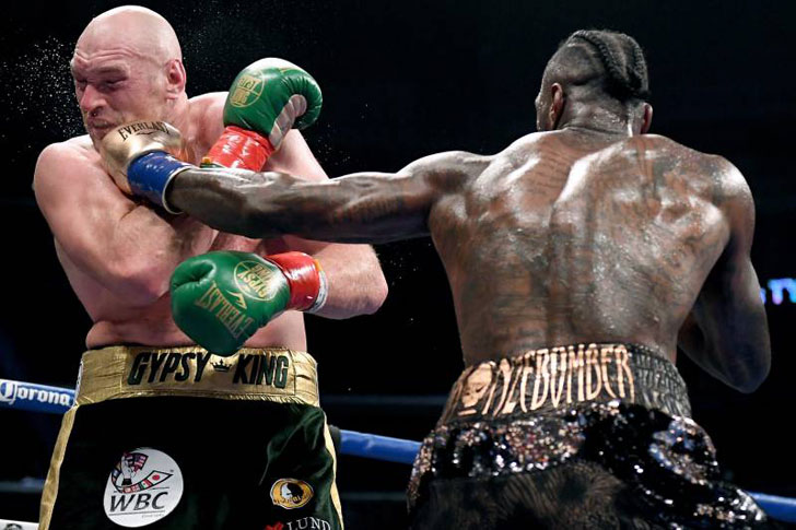 Tyson Fury with Deontay Wilder