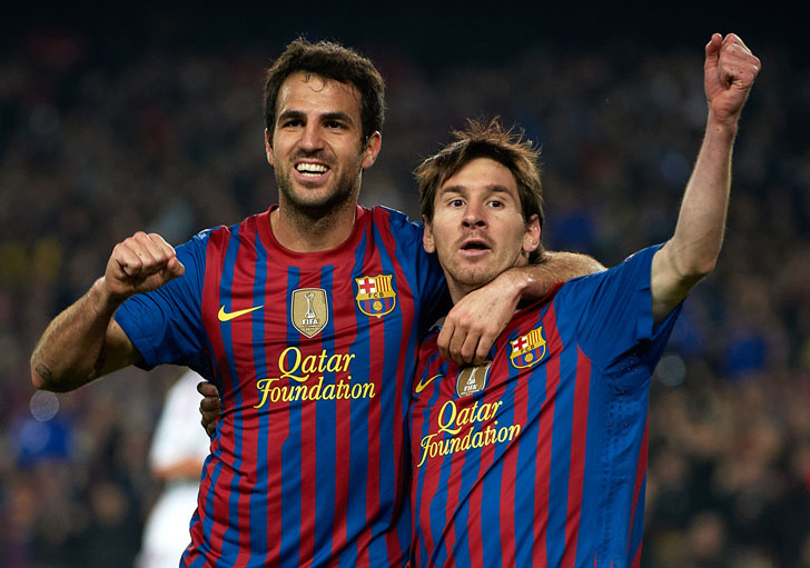 ionel Messi with Cesc Fabregas at Barcelona